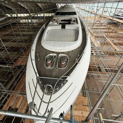 Yacht deck inside a shrink wrapped refit enclosure