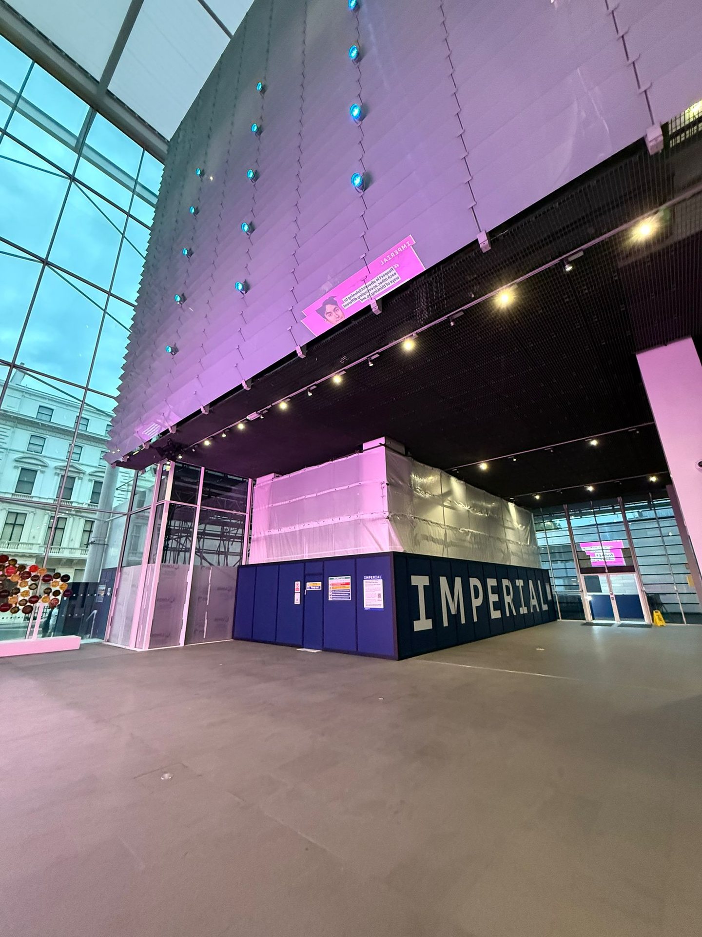 Wrapped enclosure under the Imperial College entrance canopy