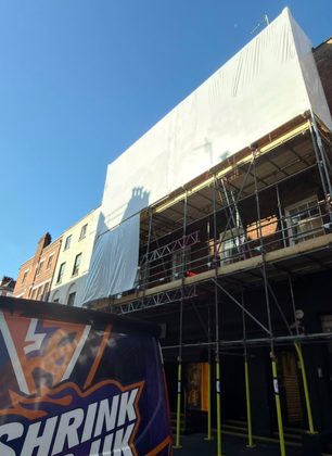 Encapsulation going up above Ronnie Scott’s by day, with the Shrink Wrap UK van