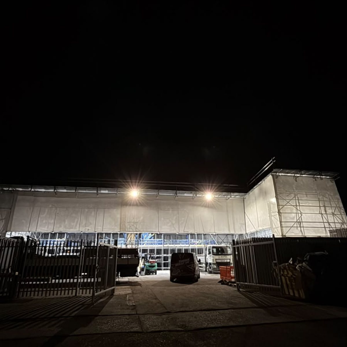 Salisbury temporary roof structure lit at night