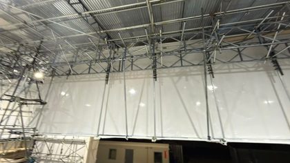 Large temporary roof structure in Salisbury enclosed with shrink wrap